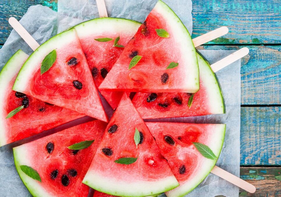 slices-of-fresh-juicy-watermelon-on-a-paper-closeup-royalty-free-image-1621087683_